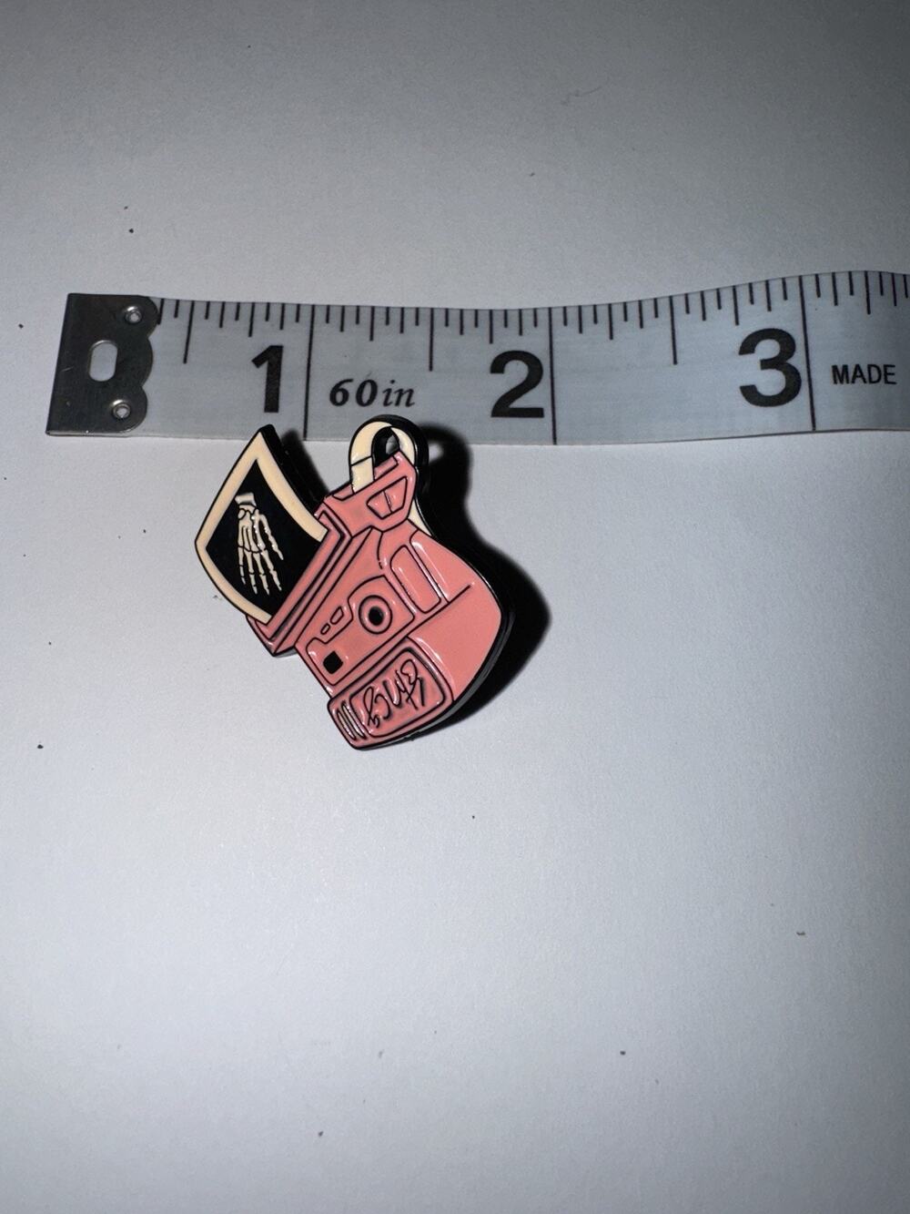 Pink Polaroid Skeleton Hand Camera Pin Brooch
